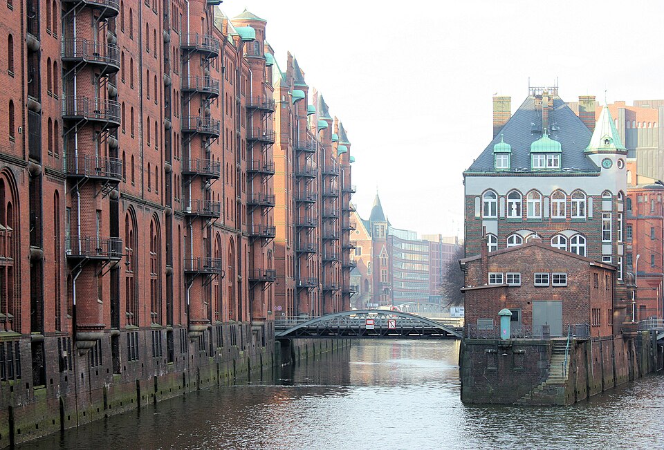 Speicherstadt canal with red brick warehouses